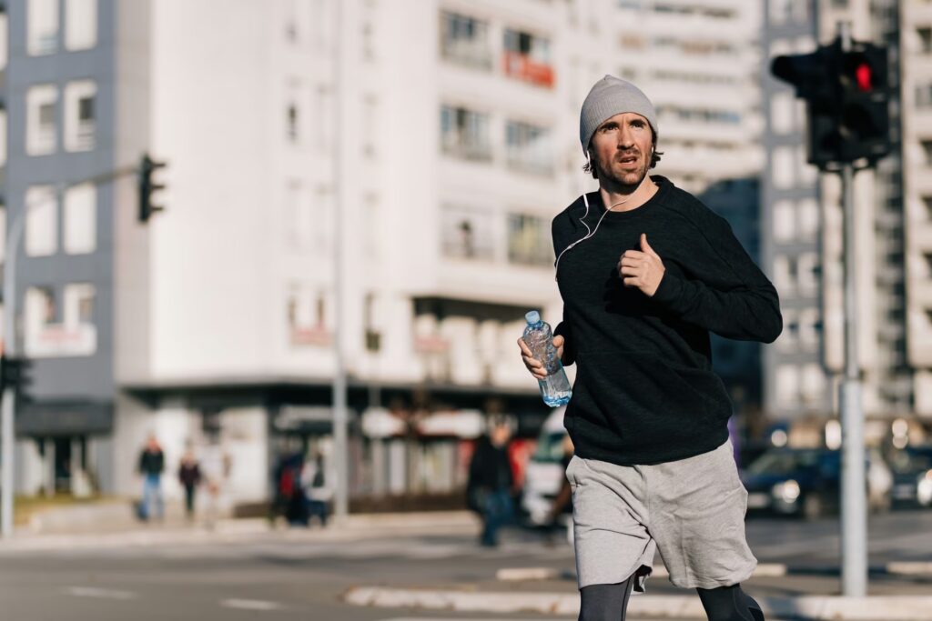 young athletic man running in the city 2024 12 13 20 38 36 utc